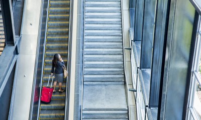 businesswoman-on-escalator_large.jpeg