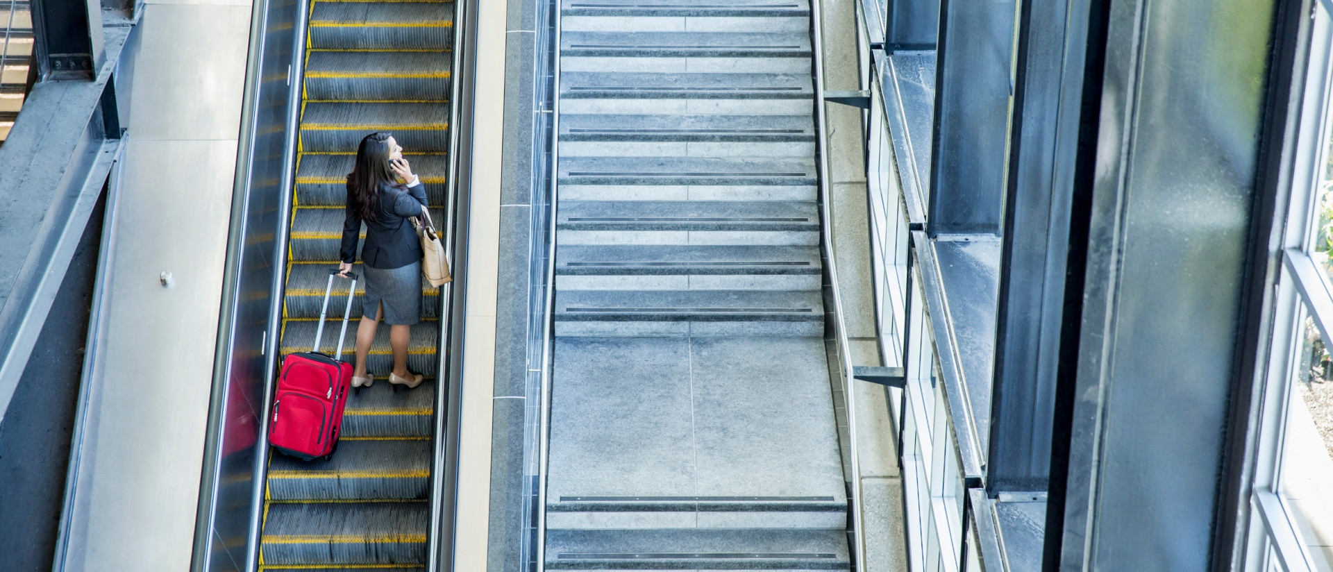 businesswoman-on-escalator_large.jpeg