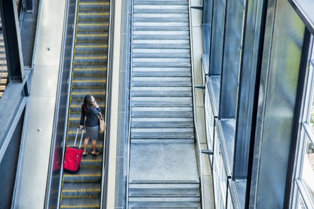 businesswoman-on-escalator_large.jpeg